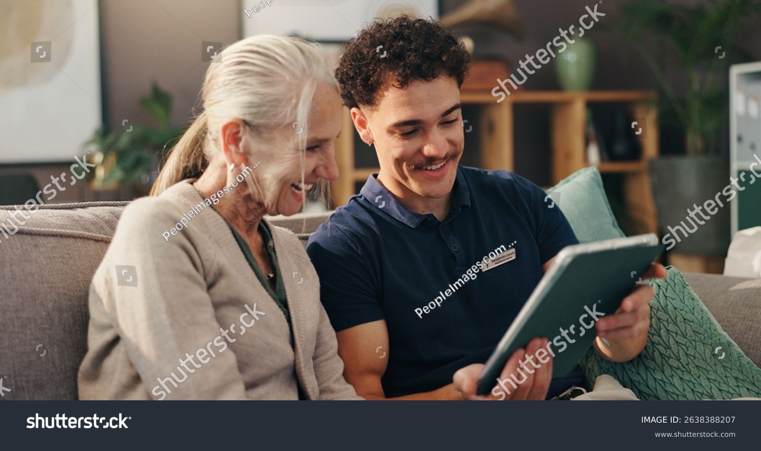 stock-photo-old-woman-nurse-and-tablet-on-sofa-happy-and-report-for-wellness-in-living-room-at-apartment-2638388207.jpg